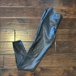 NWT Faux black leather leggings. Stretchy, size small, TTS. Still has tags on